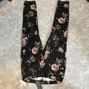 Jeans by Buffalo. 32 NWT. Floral Black and Pink jeans. Stretchy fabric